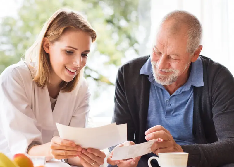 Father and daughter discussing senior living options